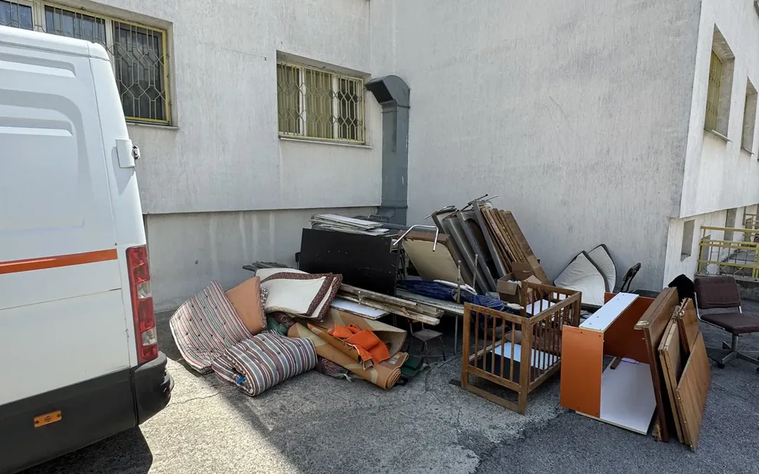 Old furniture carried out in front of a building in Sofia, ready to be hauled away